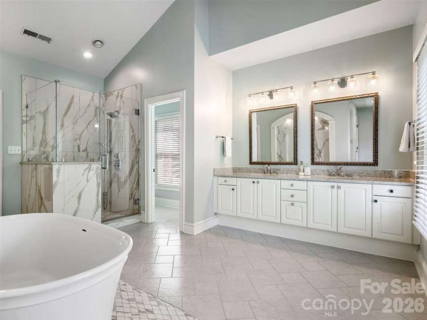 5216 Sunningdale Drive, Charlotte, NC 28277.  MLS# CAR4416178, YatesRealty ID 45821. Primary spa-like bathroom