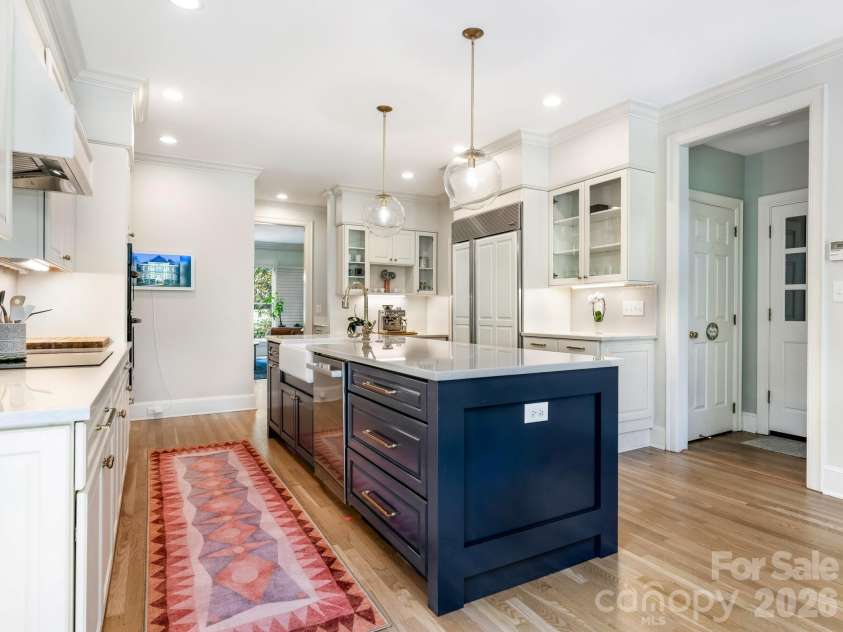 5216 Sunningdale Drive, Charlotte, NC 28277.  MLS# CAR4416178, YatesRealty ID 45821. Renovated kitchen with Wolfe cooktop, Subzero refrigerator and Bosch dishwasher