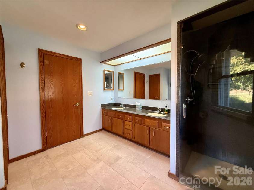 2001 Plum Tree Lane, Hendersonville, NC 28739.  MLS# CAR4333550, YatesRealty ID 4583. Owner suite bath