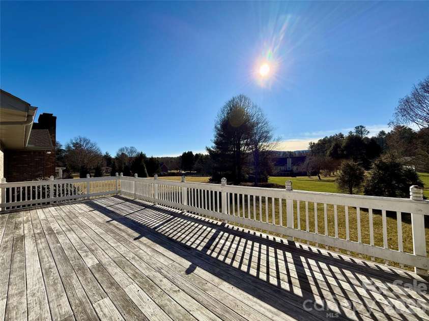 2001 Plum Tree Lane, Hendersonville, NC 28739.  MLS# CAR4333550, YatesRealty ID 4583. View on back porch