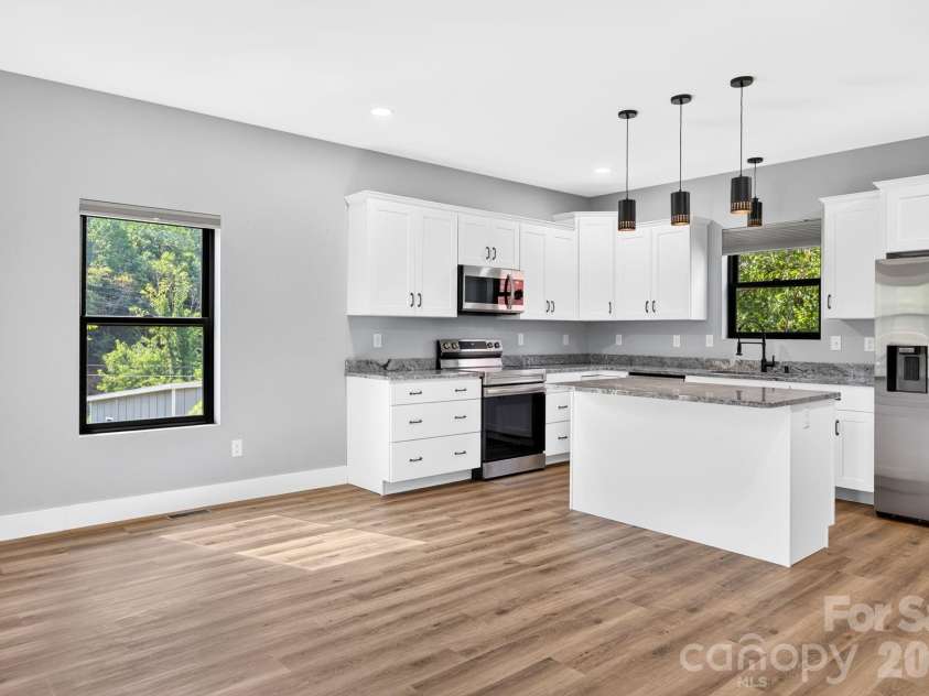 613 Salem Heights Lane, Swannanoa, NC 28778.  MLS# CAR4415923, YatesRealty ID 45830. Bright, open floor plan maximizes natural light and passive solar efficiency throughout the sustainably designed home.