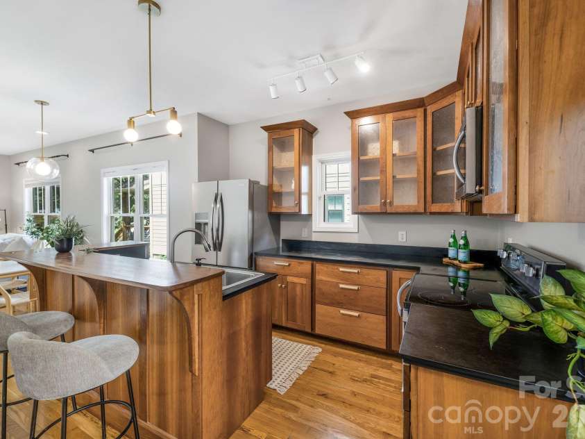 92 Martin Avenue, Asheville, NC 28806.  MLS# CAR4415858, YatesRealty ID 45835. Tasteful Cherry Kitchen