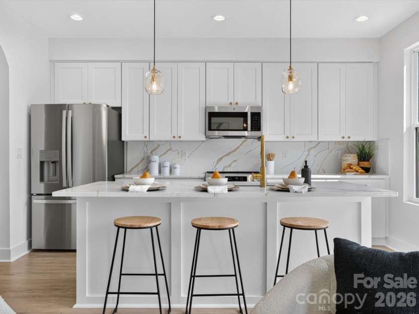 2725 Watson Drive, Charlotte, NC 28208.  MLS# CAR4415519, YatesRealty ID 45841. Beautiful Quartz Kitchen