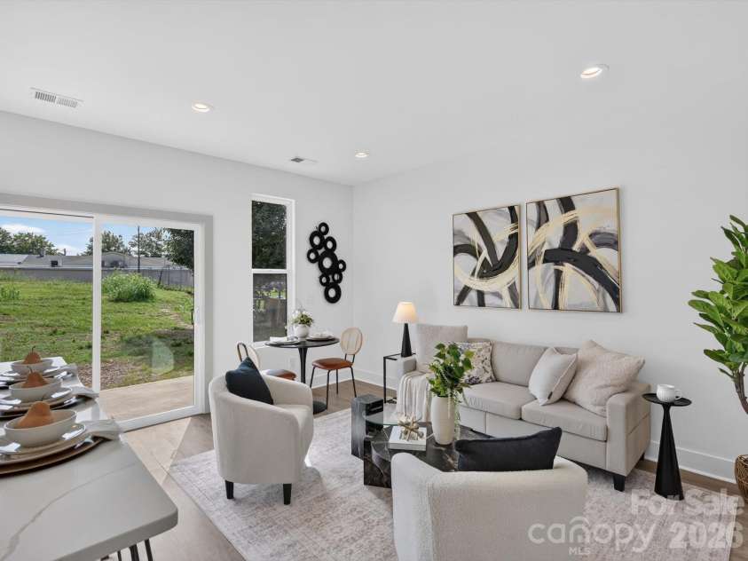 2725 Watson Drive, Charlotte, NC 28208.  MLS# CAR4415519, YatesRealty ID 45841. Bright & Airy Living Room