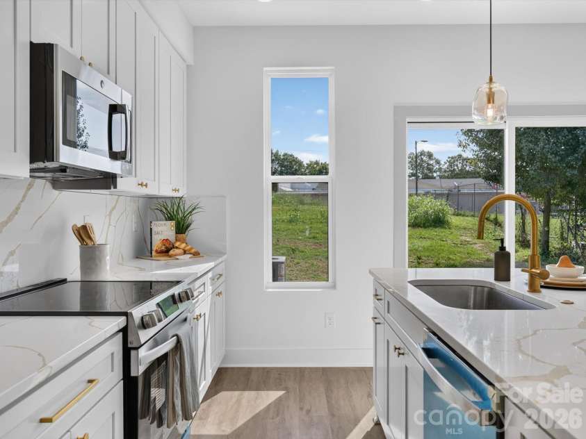 2725 Watson Drive, Charlotte, NC 28208.  MLS# CAR4415519, YatesRealty ID 45841. Function Meets Style