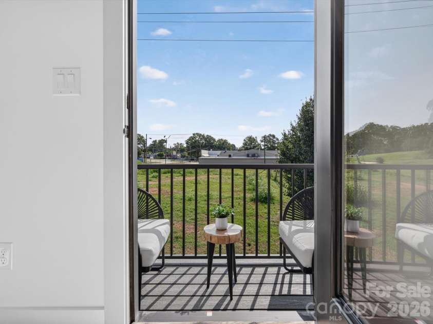 2725 Watson Drive, Charlotte, NC 28208.  MLS# CAR4415519, YatesRealty ID 45841. Private Balcony Retreat