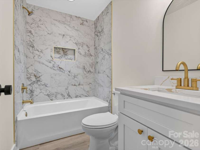 2721 Watson Drive, Charlotte, NC 28208.  MLS# CAR4415498, YatesRealty ID 45844. Fresh, Modern Bath