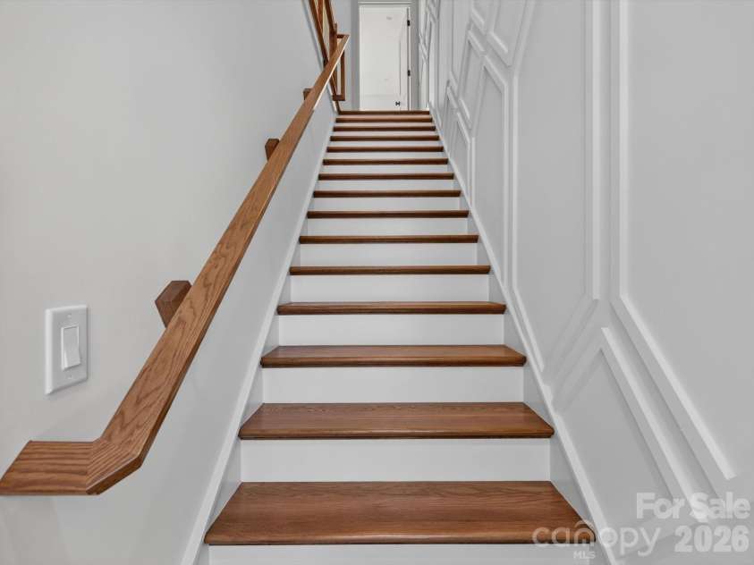2721 Watson Drive, Charlotte, NC 28208.  MLS# CAR4415498, YatesRealty ID 45844. Statement Staircase