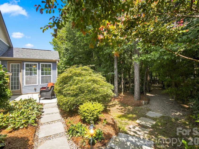 3202 Helmsley Court, Concord, NC 28027.  MLS# CAR4415344, YatesRealty ID 45850. Backyard Walkway