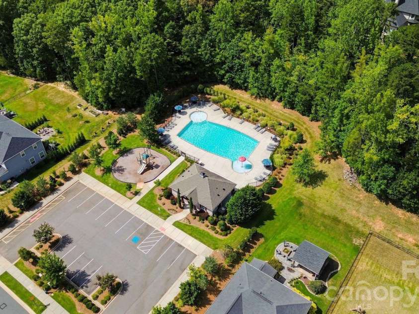 3202 Helmsley Court, Concord, NC 28027.  MLS# CAR4415344, YatesRealty ID 45850. Community Pool & Playground