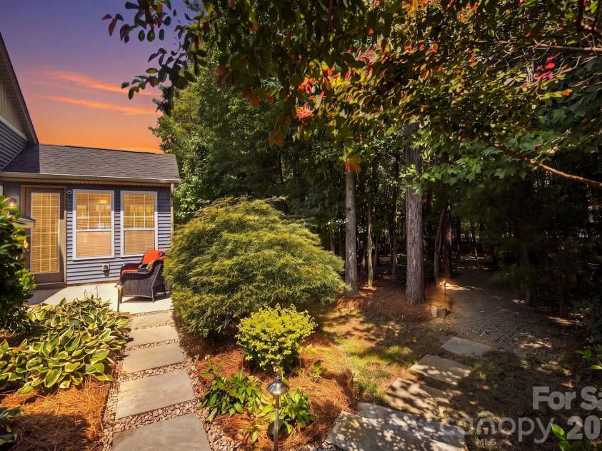 3202 Helmsley Court, Concord, NC 28027.  MLS# CAR4415344, YatesRealty ID 45850. Twilight - Back