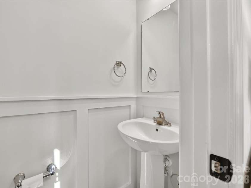 6911 Marissa Lane, Charlotte, NC 28212.  MLS# CAR4415275, YatesRealty ID 45855. Half bathroom on main level