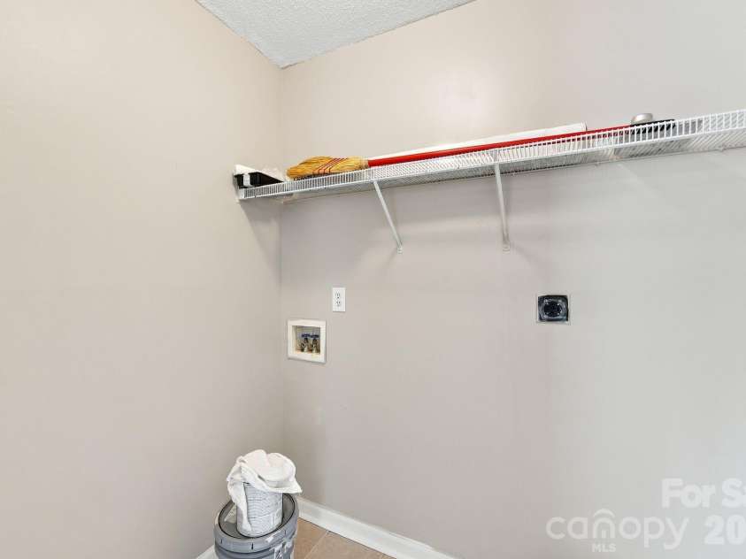 3058 Champion Lane, Concord, NC 28025.  MLS# CAR4415134, YatesRealty ID 45858. Laundry Room