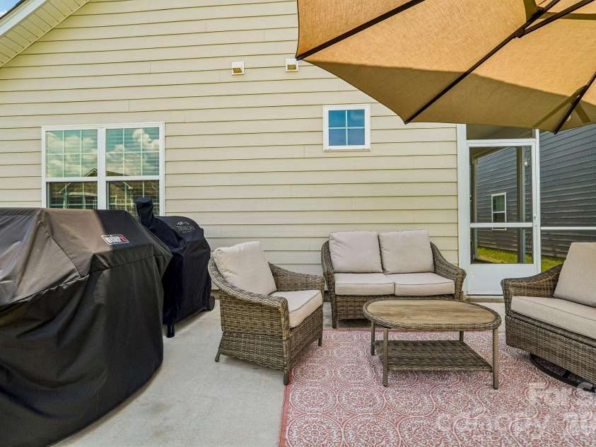 1762 Otter Perch Lane, Fort Mill, SC 29715.  MLS# CAR4414576, YatesRealty ID 45870. Extended back patio