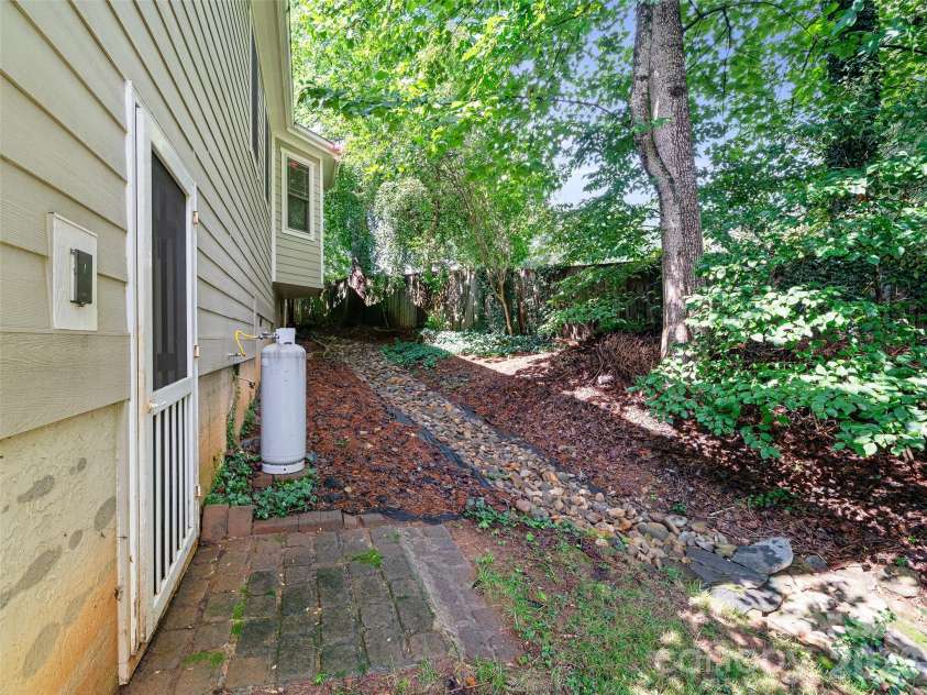6 Oak Springs Drive, Arden, NC 28704.  MLS# CAR4414524, YatesRealty ID 45873. Crawlspace entry
