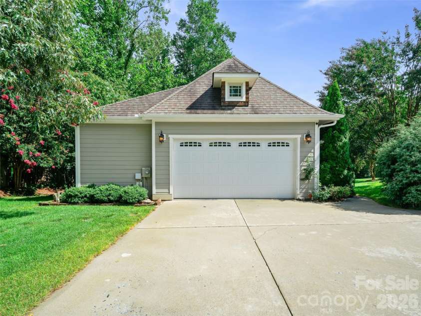 6 Oak Springs Drive, Arden, NC 28704.  MLS# CAR4414524, YatesRealty ID 45873. Side entry garage