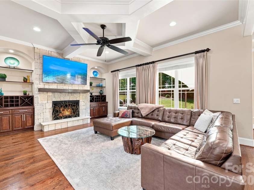 2455 Shiny Leaf Drive, Denver, NC 28037.  MLS# CAR4414414, YatesRealty ID 45874. Great room with coffered ceiling and built-ins