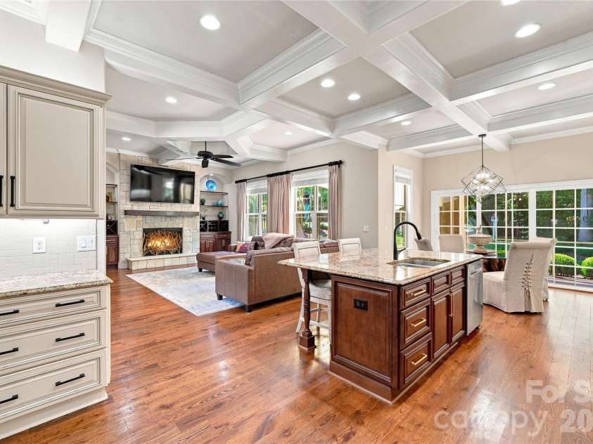 2455 Shiny Leaf Drive, Denver, NC 28037.  MLS# CAR4414414, YatesRealty ID 45874. Kitchen looking into great room and nook