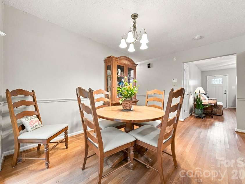 3933 MATTINGLY Drive, Hickory, NC 28602.  MLS# CAR4414536, YatesRealty ID 45875. DINING ROOM LOOKING INTO HALL AND LIVING ROOM.