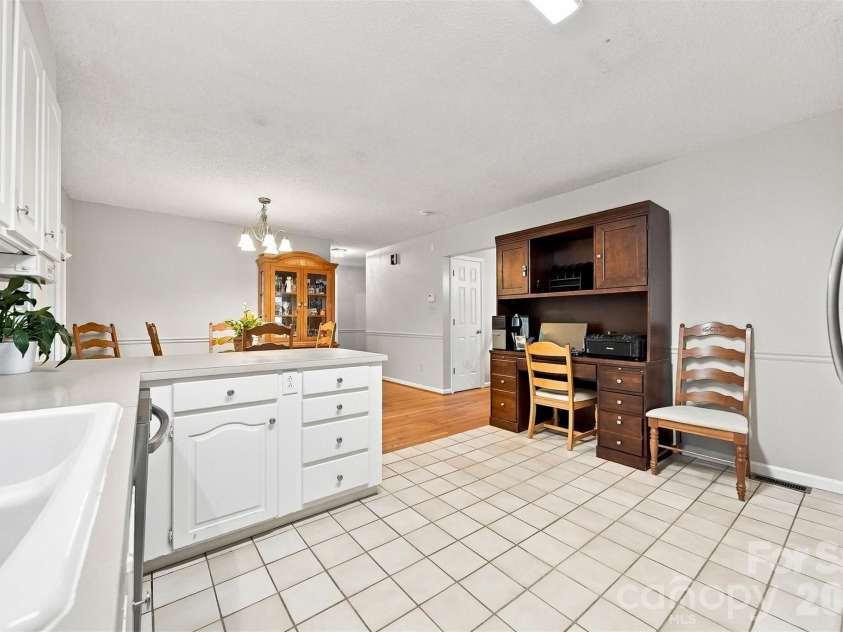 3933 MATTINGLY Drive, Hickory, NC 28602.  MLS# CAR4414536, YatesRealty ID 45875. KITCHEN, DINING