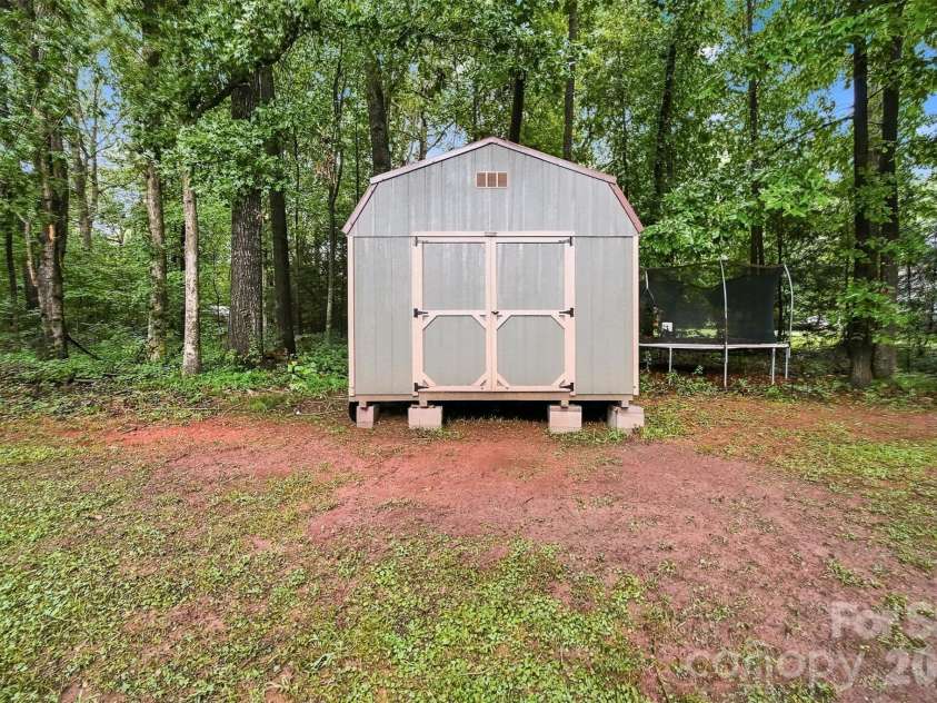 3933 MATTINGLY Drive, Hickory, NC 28602.  MLS# CAR4414536, YatesRealty ID 45875. LARGE SHED STAYS WITH THE HOME FOR ALL YOUR STORAGE NEEDS.