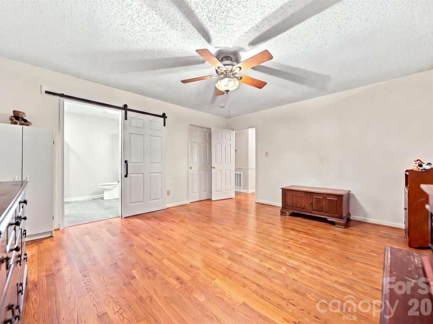 3933 MATTINGLY Drive, Hickory, NC 28602.  MLS# CAR4414536, YatesRealty ID 45875. PRIMARY BEDROOM LOOKING INTO BATH ROOM.