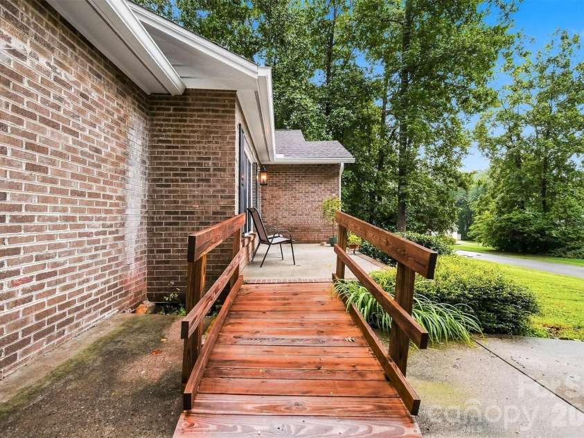 3933 MATTINGLY Drive, Hickory, NC 28602.  MLS# CAR4414536, YatesRealty ID 45875. STAIRS ARE UNDER THE HANDICAP RAMP.