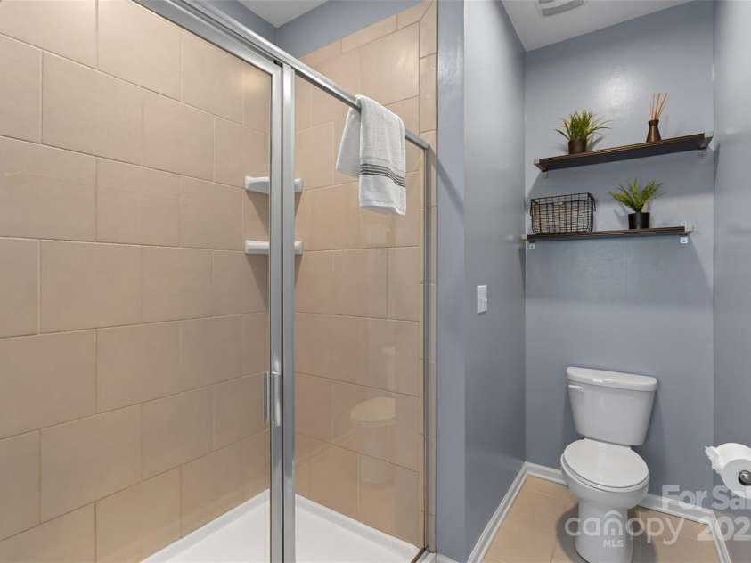 9330 Ainslie Downs Street, Charlotte, NC 28273.  MLS# CAR4223203, YatesRealty ID 4588. Primary Suite Full-Bath