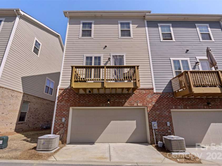 9330 Ainslie Downs Street, Charlotte, NC 28273.  MLS# CAR4223203, YatesRealty ID 4588. Rear of the Townhome