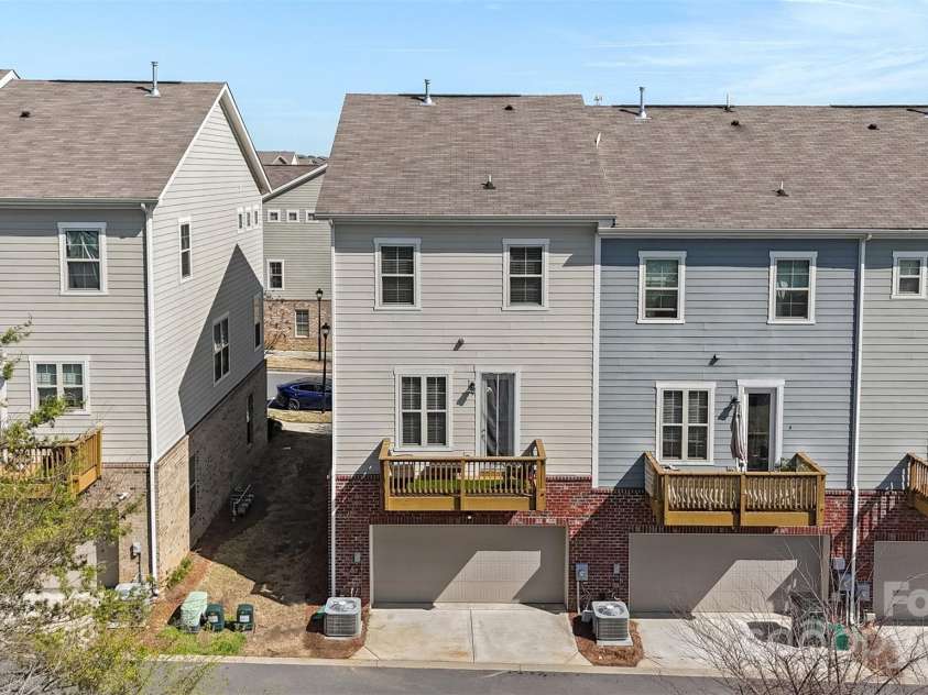 9330 Ainslie Downs Street, Charlotte, NC 28273.  MLS# CAR4223203, YatesRealty ID 4588. Rear of the Townhome - End Unit