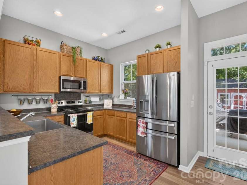 1308 Rising Oak Drive, Charlotte, NC 28206.  MLS# CAR4413620, YatesRealty ID 45886. 