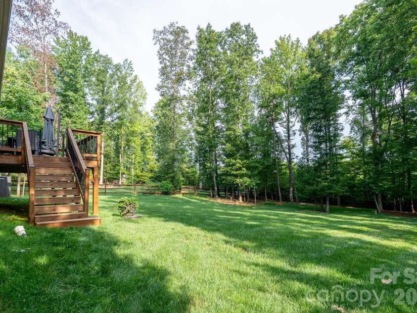 157 Wylie Trail, Statesville, NC 28677.  MLS# CAR4412962, YatesRealty ID 45893. The large back Yard