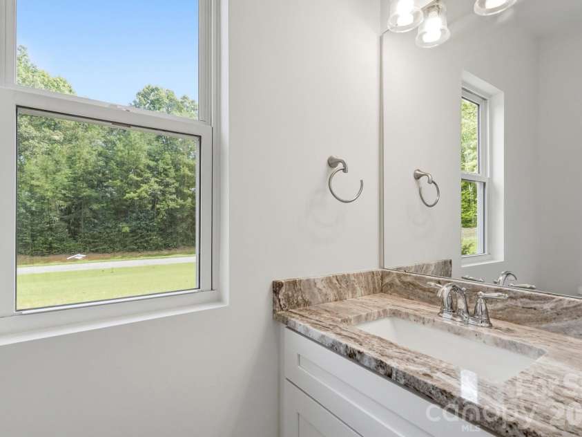 2704 Yellow Bell Way, Monroe, NC 28112.  MLS# CAR4413167, YatesRealty ID 45894. Main floor 1/2 bathroom