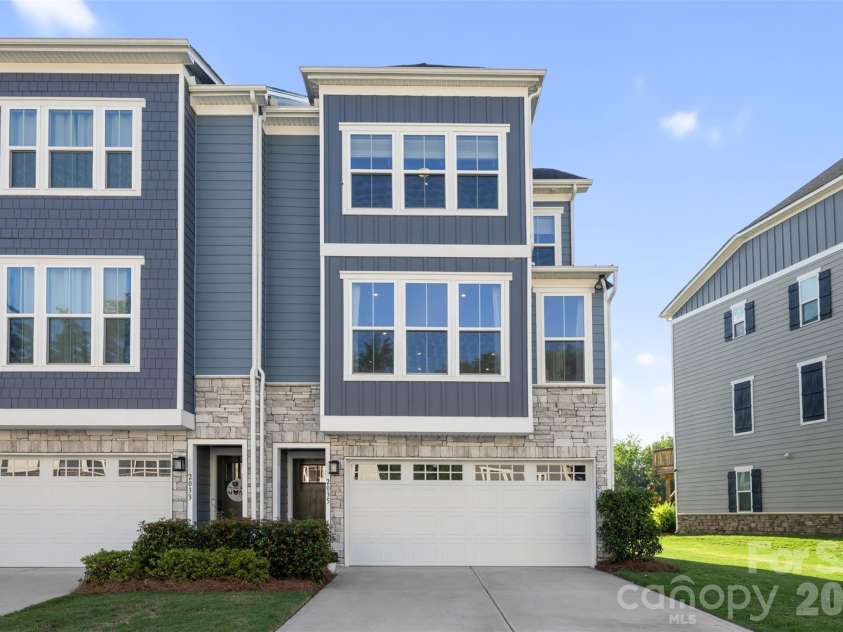 2035 Dornoch Road, Tega Cay, SC 29708.  MLS# CAR4412900, YatesRealty ID 45896. End unit with green space