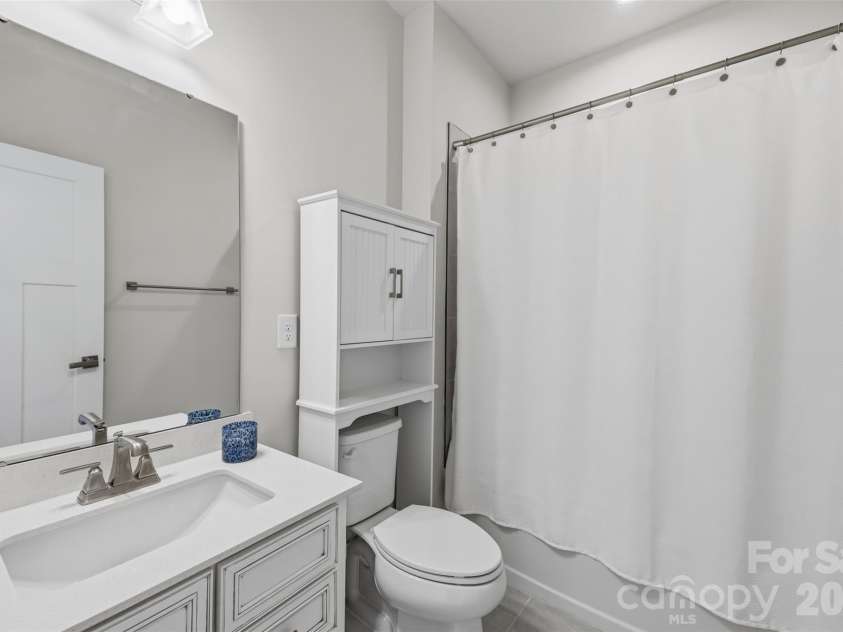 2035 Dornoch Road, Tega Cay, SC 29708.  MLS# CAR4412900, YatesRealty ID 45896. Full bath upper hallway