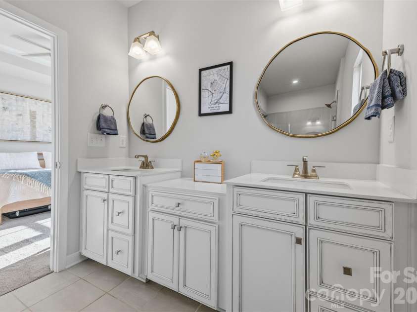 2035 Dornoch Road, Tega Cay, SC 29708.  MLS# CAR4412900, YatesRealty ID 45896. Primary bath with upgraded cabinets