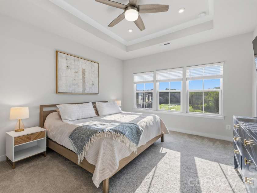 2035 Dornoch Road, Tega Cay, SC 29708.  MLS# CAR4412900, YatesRealty ID 45896. Primary bedroom with trey ceiling