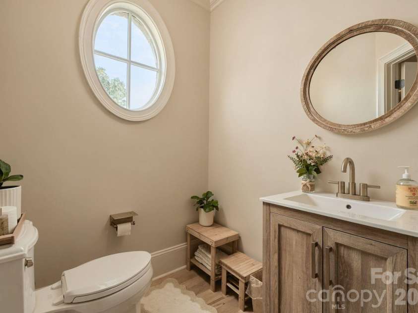 7275 Flowes Store Road, Concord, NC 28025.  MLS# CAR4429862, YatesRealty ID 45900. Half bathroom