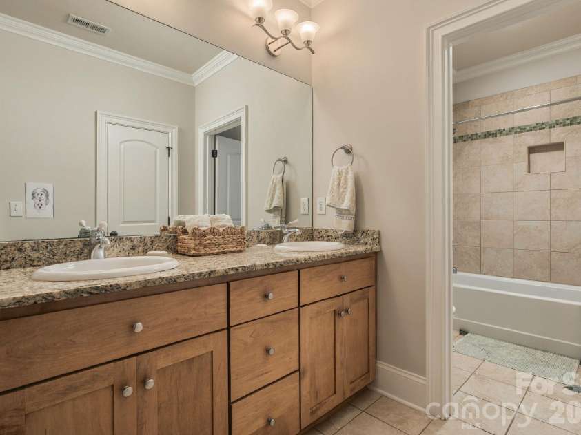 7275 Flowes Store Road, Concord, NC 28025.  MLS# CAR4429862, YatesRealty ID 45900. Jack & Jill bathroom shared by 3rd and 4th bedrooms