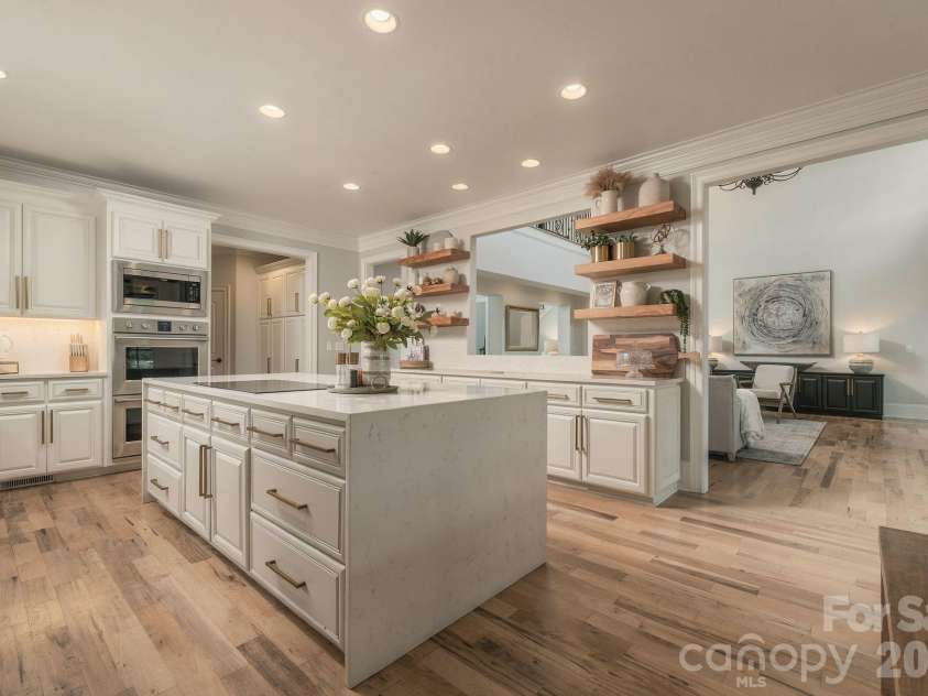 7275 Flowes Store Road, Concord, NC 28025.  MLS# CAR4429862, YatesRealty ID 45900. Kitchen designed for function and flow between living spaces