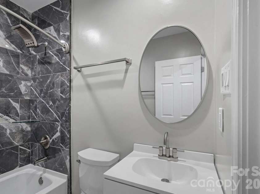 2561 Lumina Avenue, Charlotte, NC 28208.  MLS# CAR4412298, YatesRealty ID 45902. Guest Bathroom