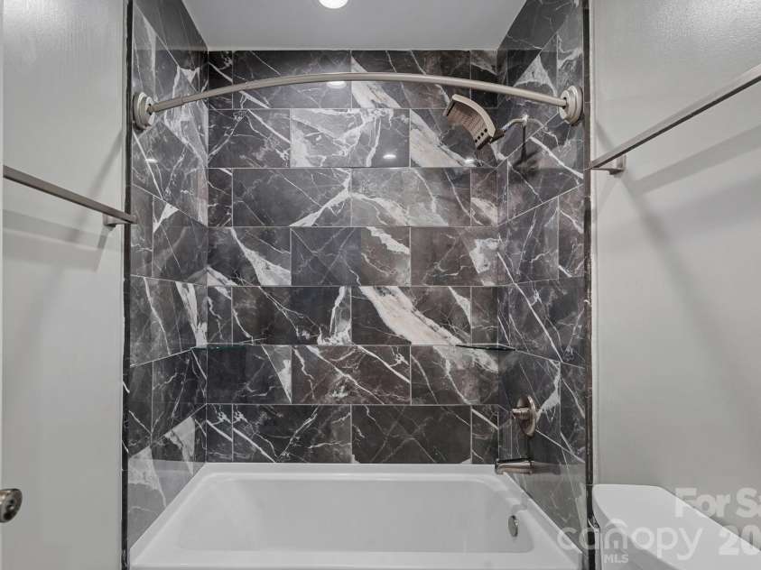 2561 Lumina Avenue, Charlotte, NC 28208.  MLS# CAR4412298, YatesRealty ID 45902. Guest Bathroom