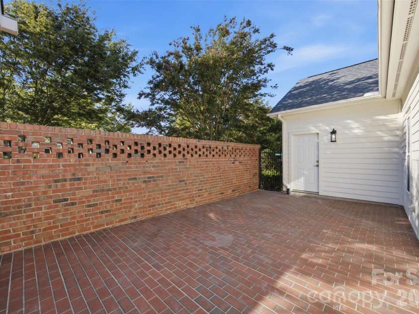 133 Harper Lee Street, Davidson, NC 28036.  MLS# CAR4412095, YatesRealty ID 45903. A very large, private patio for this community.