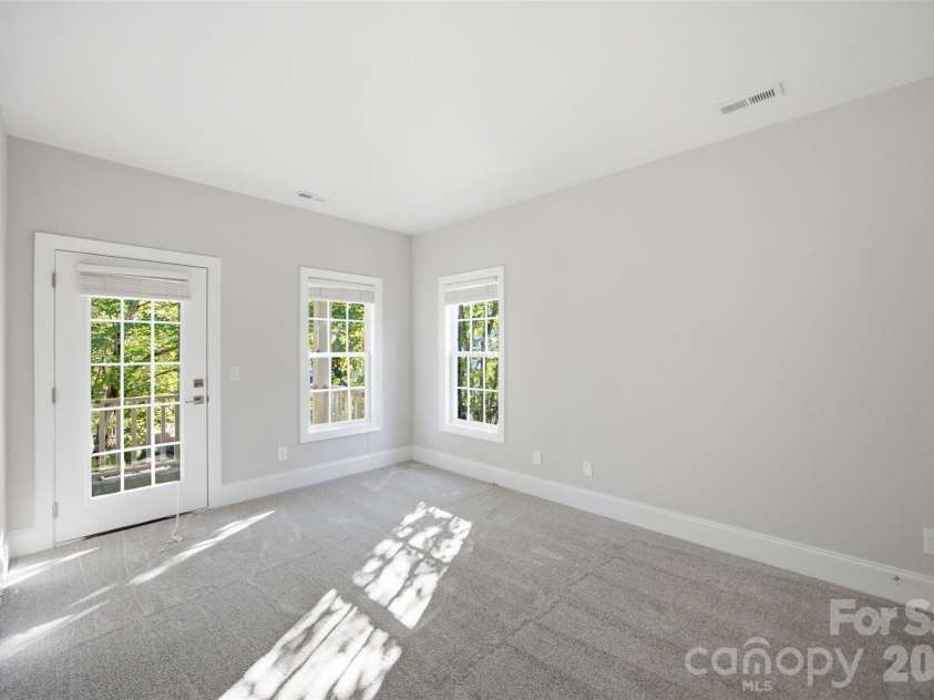 133 Harper Lee Street, Davidson, NC 28036.  MLS# CAR4412095, YatesRealty ID 45903. Bedroom 2 with access to 2nd level porch.