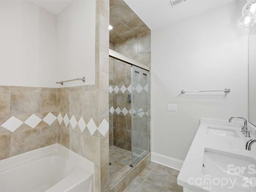 133 Harper Lee Street, Davidson, NC 28036.  MLS# CAR4412095, YatesRealty ID 45903. New Shower Door