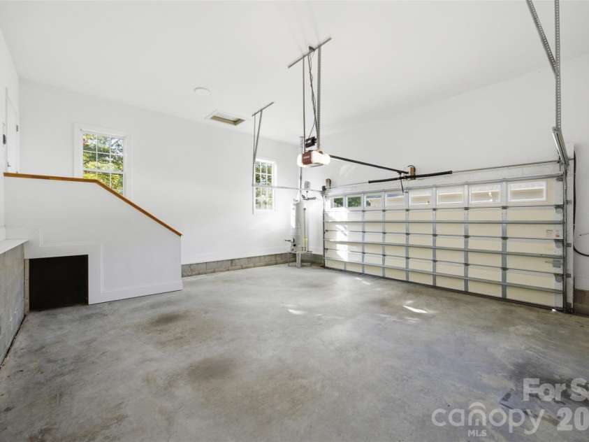 133 Harper Lee Street, Davidson, NC 28036.  MLS# CAR4412095, YatesRealty ID 45903. Oversized two car garage with stroage.