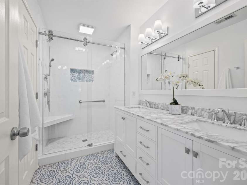 2139 Kaybird Lane, Charlotte, NC 28270.  MLS# CAR4411622, YatesRealty ID 45906. Fully renovated primary bathroom