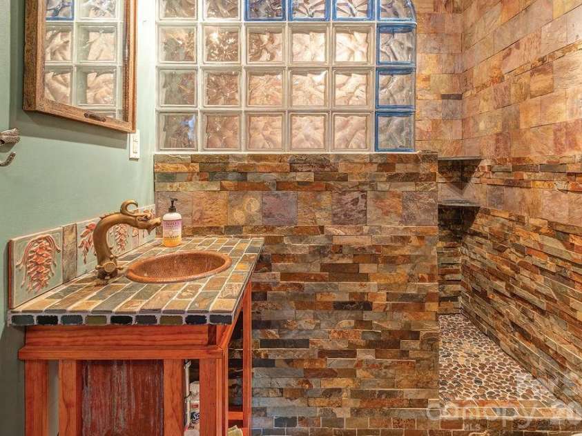 78 Flint Street, Asheville, NC 28801.  MLS# CAR4411908, YatesRealty ID 45907. Unique Full Bath Down Stairs
