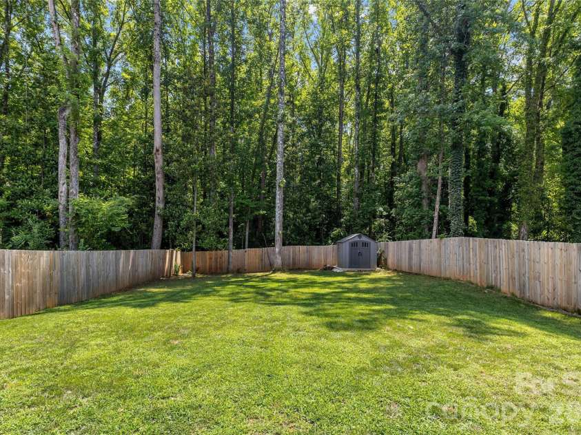 1913 Marlwood Circle, Charlotte, NC 28227.  MLS# CAR4407979, YatesRealty ID 45917. Backyard