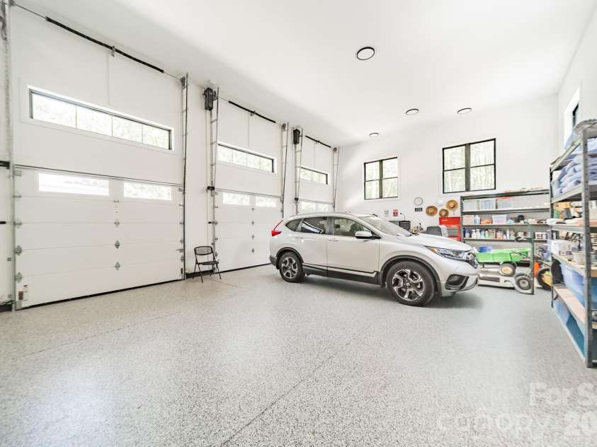 1725 Turtlewood Drive, Waxhaw, NC 28173.  MLS# CAR4407986, YatesRealty ID 45919. Epoxy Flooring in Garage